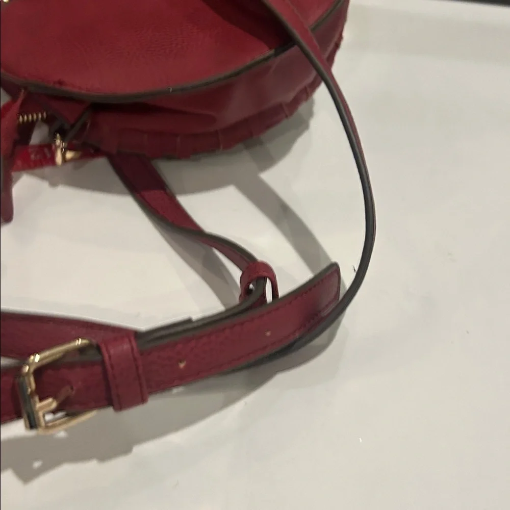 Carlos Santana faux pebbled leather maroon western crossbody bag laser cut rings